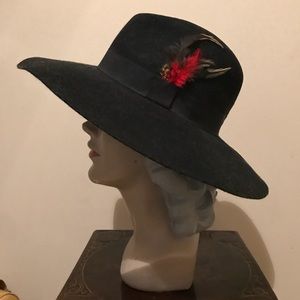 Black wide brim hat with feather